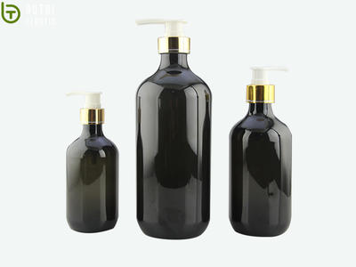 Big round dark green plastic PET shampoo bottle with label for personal care